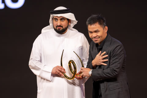 Sheikh Ahmed Bin Mohammed Bin Rashid Al Maktoum, Second Deputy Ruler of Dubai and Chairman of the Dubai Media Council  presenting the award to legendary Filipino boxer Manny Pacquiao on the opening day of World Sports Summit in Dubai on Monday.