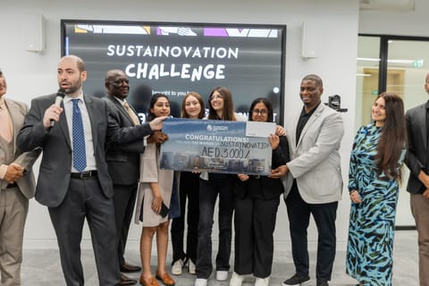Sustainovation Challenge winners receiving their awards from organisers, DMU Dubai and Ehfaaz 