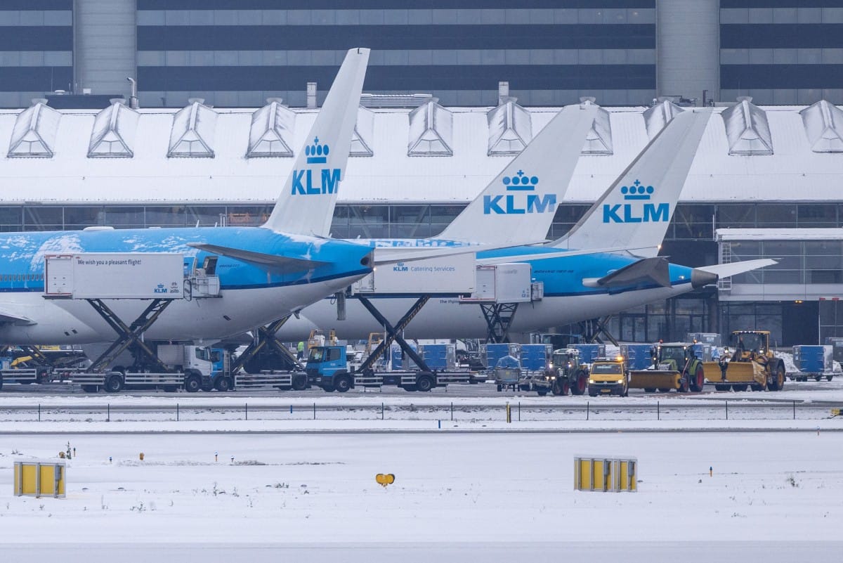 This photograph shows airplanes of Dutch airline KLM on the tarmac at Amsterdam Schiphol airport on January 7, 2026.