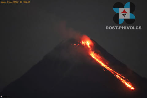 In this photo provided by the Philippine Institute of Volcanology and Seismology, lava flows from the crater of the Mayon volcano as alert level 3 remains raised in Albay province, north eastern Philippines on Wednesday Jan. 7, 2026. (Philippine Institute of Volcanology and Seismology via AP)