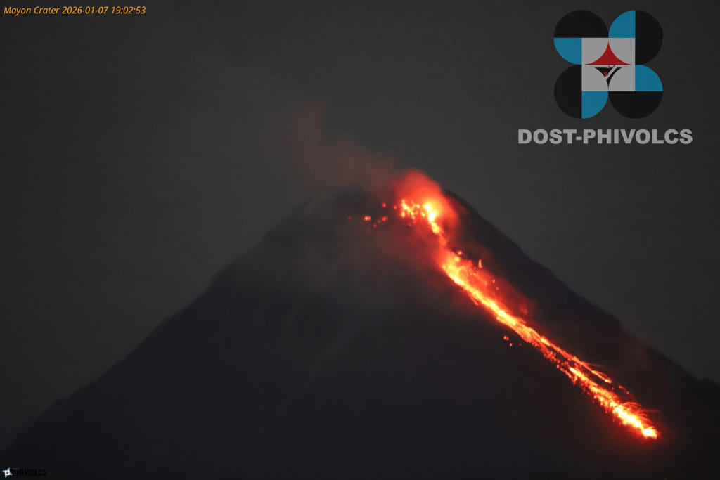 In this photo provided by the Philippine Institute of Volcanology and Seismology, lava flows from the crater of the Mayon volcano as alert level 3 remains raised in Albay province, north eastern Philippines on Wednesday Jan. 7, 2026. (Philippine Institute of Volcanology and Seismology via AP)