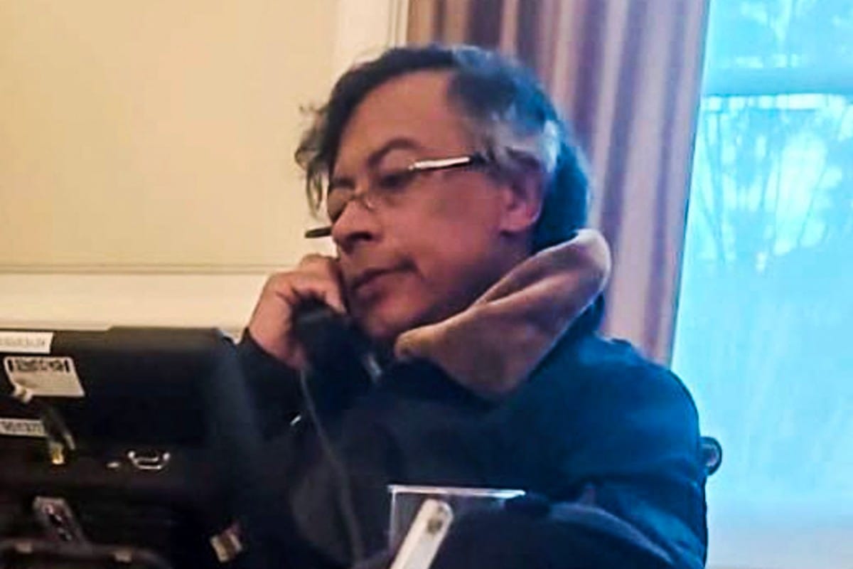 Handout video grab provided by Colombia's presidency press office showing Colombia's President Gustavo Petro talking on the phone with his US counterpart Donald Trump, at Narino Palace in Bogota on January 7, 2026.
