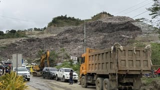 Philippines: 13 rescued alive, 25 missing, 1 killed in Cebu landfill collapse