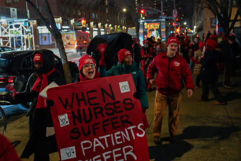 Nurses strike outside Mount Sinai West Hospital, Monday, Jan. 12, 2026, in New York. 