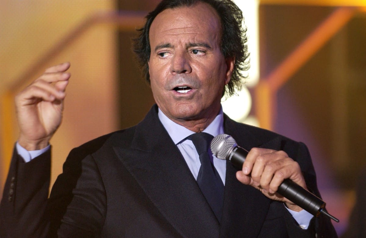 Spanish singer Julio Iglesias sings during the Telethon television program in Paris on December 6, 2003.