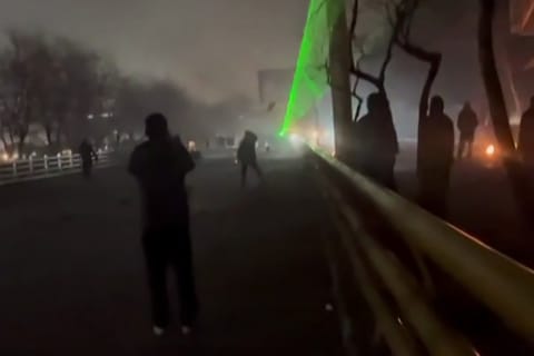 This video grab taken on January 13, 2026 from UGC images posted on social media on January 10, 2026 shows clashes in Mashhad, in northeastern Iran.