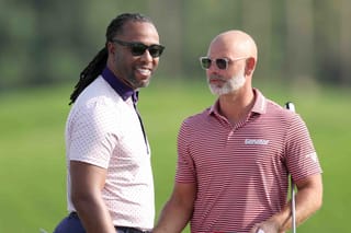 NFL legend Fitzgerald benefits from Harrington swing tips at Dubai Invitational