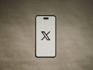 X resumes normal operations