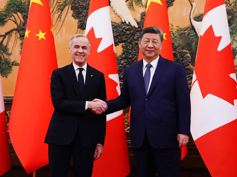 Canada's Prime Minister Mark Carney, left, meets with Chinese President Xi Jinping at the Great Hall of the People in Beijing Friday, Jan. 16, 2026.  