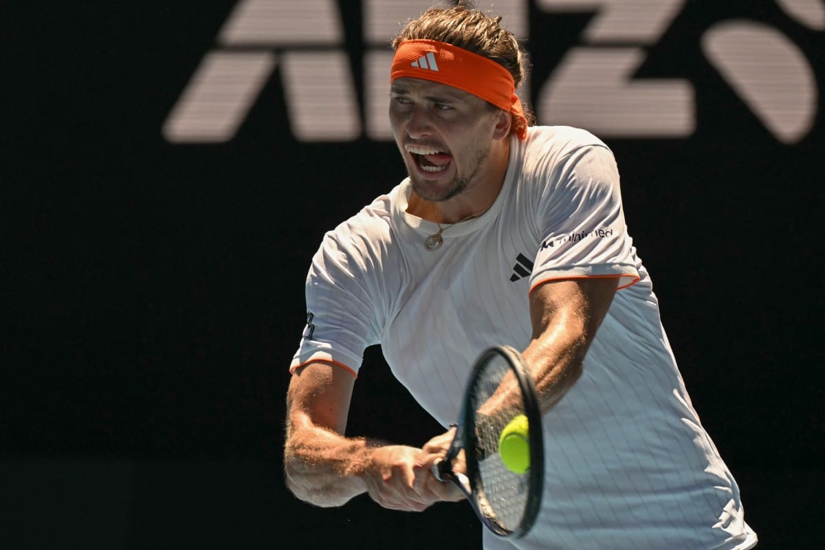 Germany's Alexander Zverev hits a return to Canada's Gabriel Diallo during their men's singles match on day one of the Australian Open tennis tournament in Melbourne on January 18, 2026.