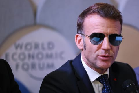 France's President Emmanuel Macron delivers remarks during a meeting with leaders of AI companies during the World Economic Forum (WEF) annual meeting in Davos on January 20, 2026.