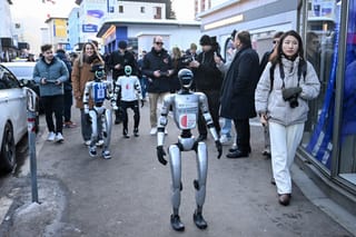Dancing robots turn heads on the streets of Davos