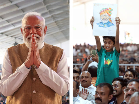 PM Modi pauses rally for child holding his sketch