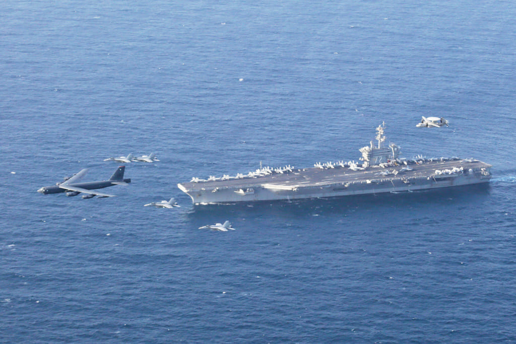 The USS Abraham Lincoln carrier and a US Air Force B-52H Stratofortress, conduct joint exercises in the US Central Command area of responsibility in Arabian Sea June 1, 2019. 