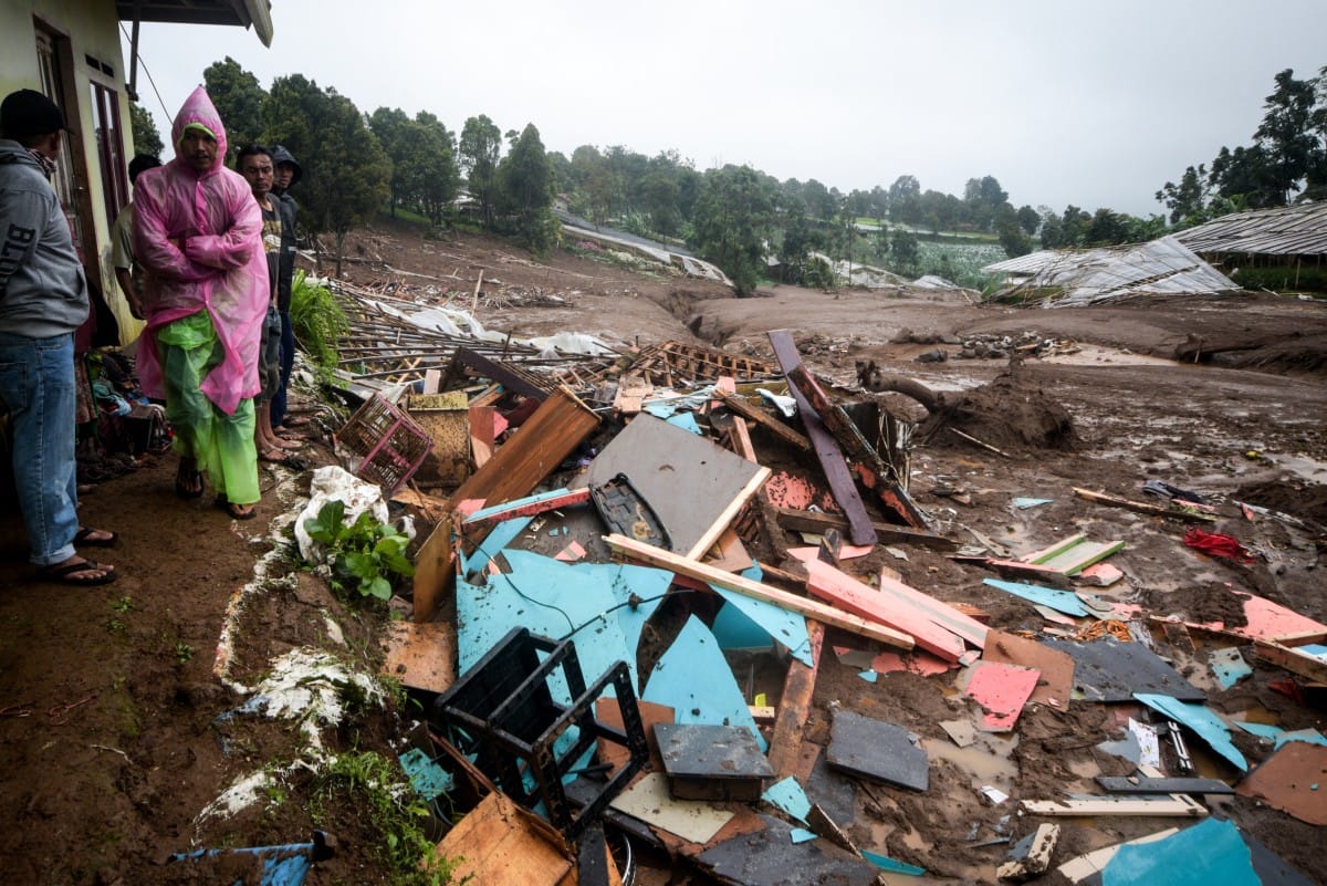 Debris from destroyed houses remains after a landslide struck in Pasirlangu village, Bandung, West Java.