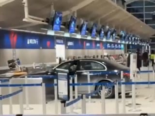 Video: Car crashes into Detroit airport entrance, six injured