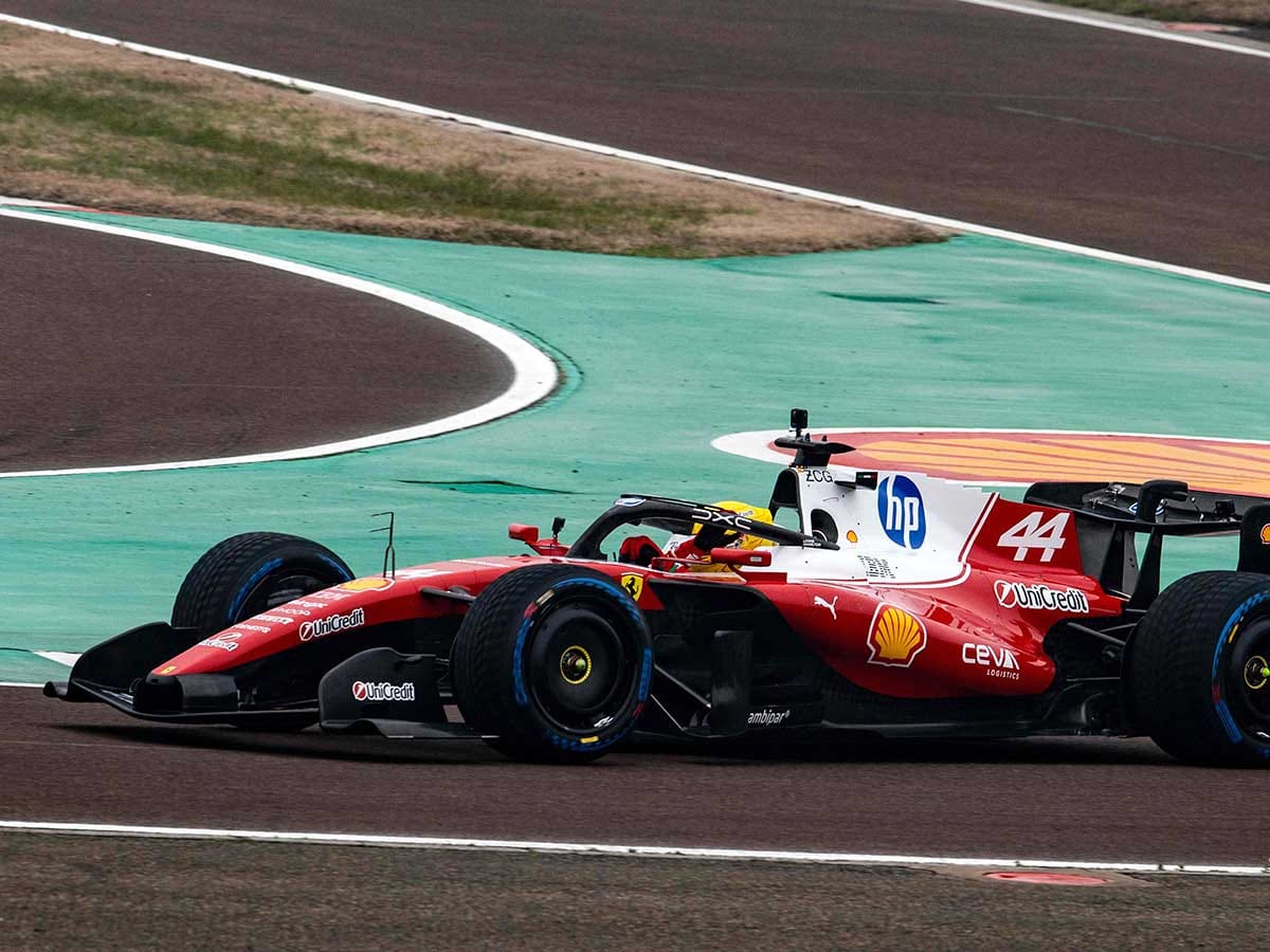 Lewis Hamilton (44) of Great Britain  waves to fans as he steers the new Formula 1 Ferrari SF-26 during tests at Fiorano Circuit in Fiorano Modenese.