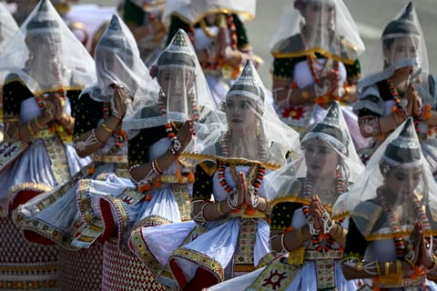 Manipuri dancers perform during India's 77th Republic Day parade at Kartavya Path in New Delhi on January 26, 2026.