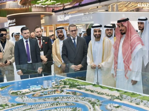 Sheikh Dr Salem bin Abdulrahman bin Salem Al Qasimi, Chairman of the Ruler’s Office in Sharjah, with Sultan Al Shakrah, Chairman of Ajmal Makan Real Estate Development, and Farid Jamal,Chief Commercial Officer, during the ACRES 2026.