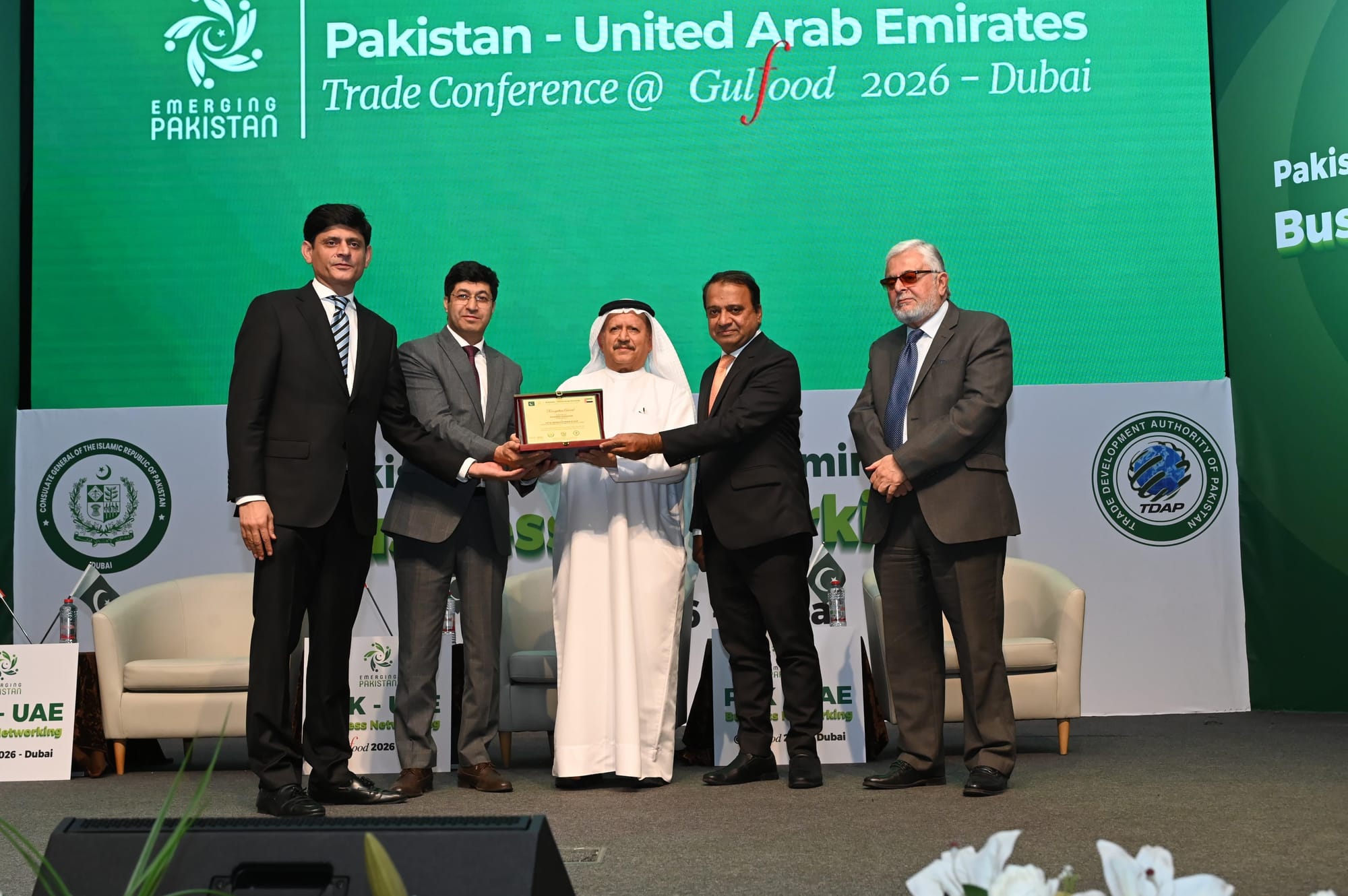 Dr Mohammed Saeed Al Kindi, former UAE Minister of Water and Environment receiving shield from Hussain Muhammed; Ali Khan and Athar Hussain Khokhar at the event in Dubai
