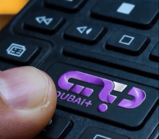 A screen displaying the Dubai+ streaming platform logo on a digital device.