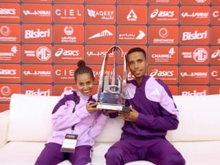 Nibret Melak (Men) and Anchinalu Dessie (women) both from Ethiopia winners of the 25th anniversary edition of the Dubai Marathon
