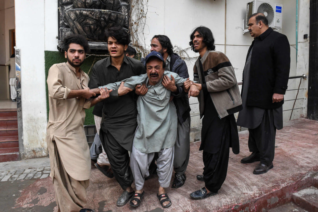 Family members mourn the death of a relative killed in an attack by terrorists, at a hospital in Quetta on January 31, 2026.  