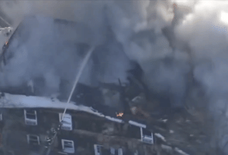 Gas blast sparks fire at a US mental health facility, wreckage scattered in the snow