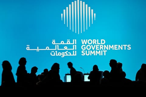 Delegates arrive at the plenary hall to attend the World Governments Summit in Dubai on February 3, 2026.
