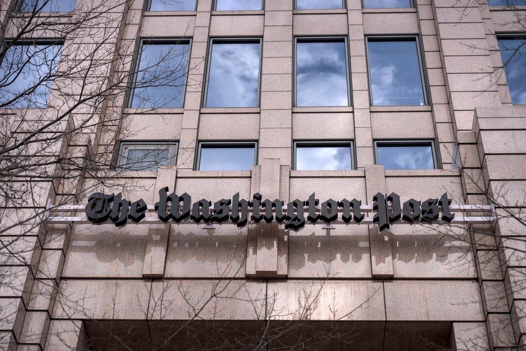 A sign for the Washington Post is seen at the company's offices, Monday, Jan. 26, 2026, in Washington.  