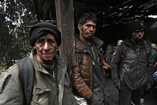Miners are seen outside the coal mine in Guacheta, Cundinamarca department, Colombia. File photo taken on February 6, 2026.