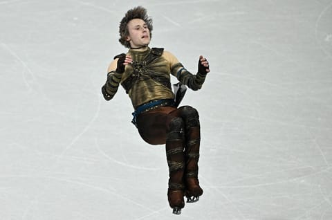 USA's Ilia Malinin performs a backflip as he competes in the figure skating team event during the Milano Cortina 2026 Winter Olympic Games 