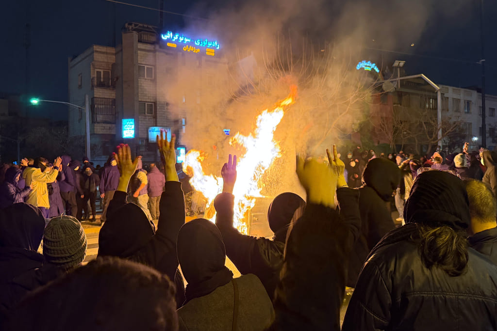 In this photo obtained by The Associated Press, Iranians attend an anti-government protest in Tehran, Iran, Friday, Jan. 9, 2026. 
