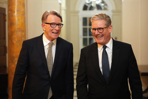 In this file picture, British Prime Minister Keir Starmer, right, talks with Britain's ambassador to the United States Peter Mandelson during a welcome reception at the ambassador's residence on Wednesday, Feb. 26, 2025 in Washington. 