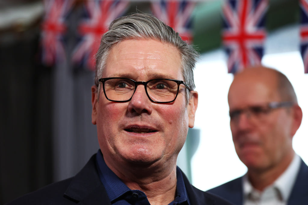 Britain's Prime Minister Keir Starmer talks with members of the audience after delivering a speech at Horntye Park Sports Complex in St Leonards-on-Sea, East Sussex, England, Thursday, Feb. 5, 2026.