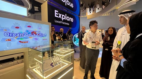 Saeed bin Mubarak Al Hajeri, Minister of State and Chairman of the Board of Directors of EDE and Dr Fatima Al Kaabi, Director General of EDE being briefed about the technology at WHX in Dubai. 