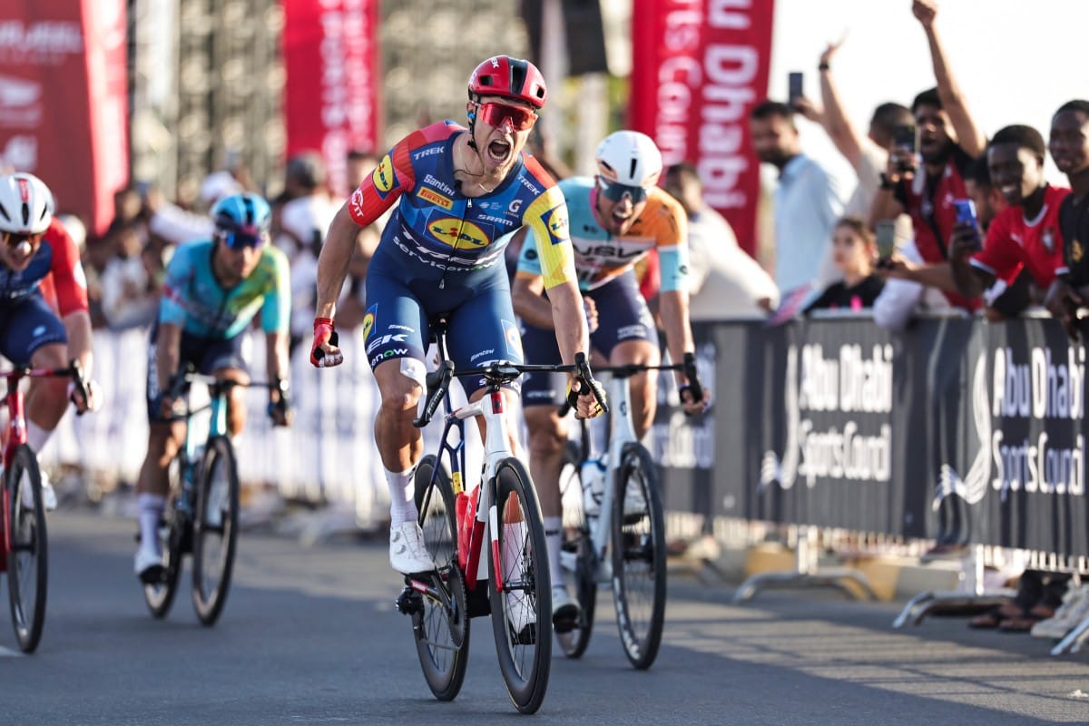 Jonathan Lidl-Trek's Italian rider Jonathan Milan reacts after crossing the finish line first during the fourth stage of the UAE Tour cycling event in al-Fujairah on February 19, 2026.