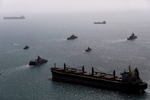 This image provided Thursday Feb. 19, 2026 by the Iranian military shows navy ships conducting operations during a join drill by Iranian and Russian forces in the Indian Ocean. 
