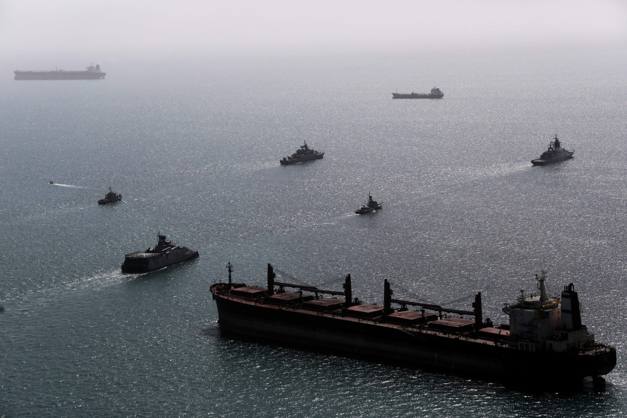 This image provided Thursday Feb. 19, 2026 by the Iranian military shows navy ships conducting operations during a join drill by Iranian and Russian forces in the Indian Ocean. 