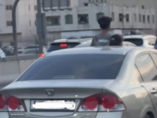 Abu Dhabi safety alert: ECA warns parents against children leaning out of cars