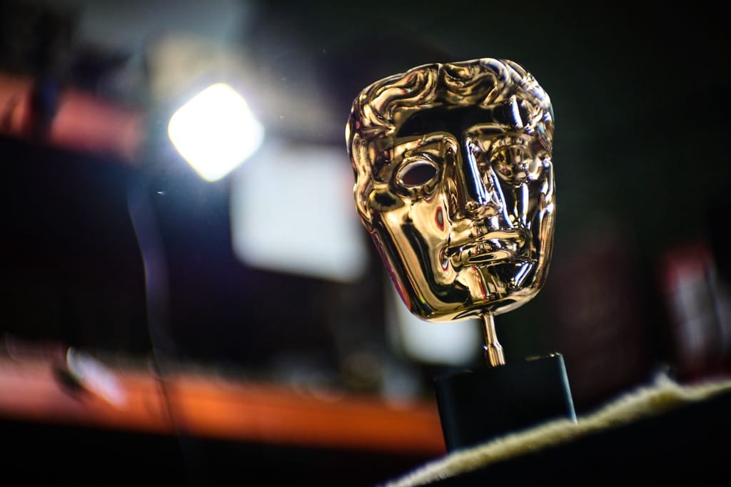 A completed British Academy Film Awards mask sits on a workbench at the FSE Foundry in Braintree, England