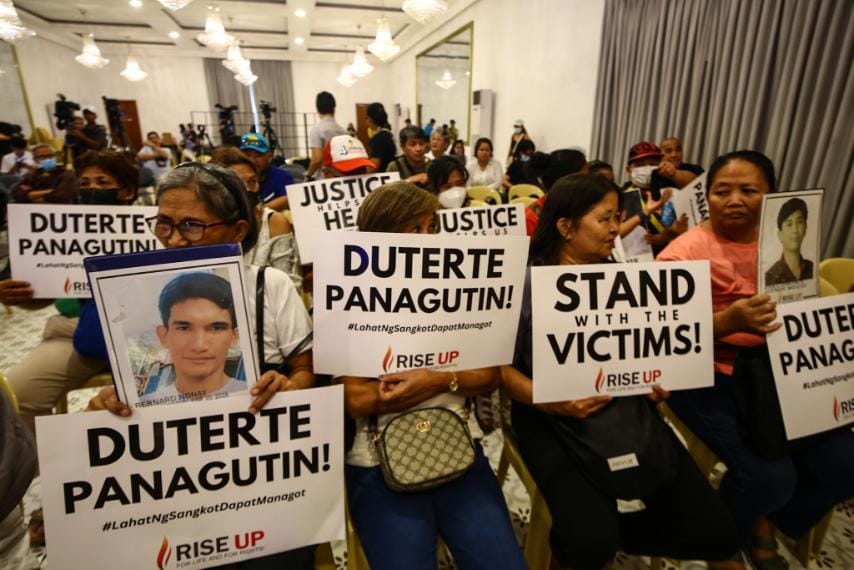 DUTERTE WATCH. Relatives and supporters of alleged extrajudicial killing victims watch the confirmation of charges hearing of former president Rodrigo R. Duterte at the University of the Philippines-Diliman in Quezon City on Monday (Feb. 23, 2026). The International Criminal Court at The Hague, the Netherlands started the first of four sessions to determine if there are enough evidence to try Duterte for crimes against humanity charges related to his anti-drug war as Davao City mayor and as Philippine president. (PNA photo by Joan Bondoc)