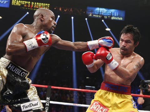 Manny Pacquiao will take on Floyd Mayweather Jr. once again in September