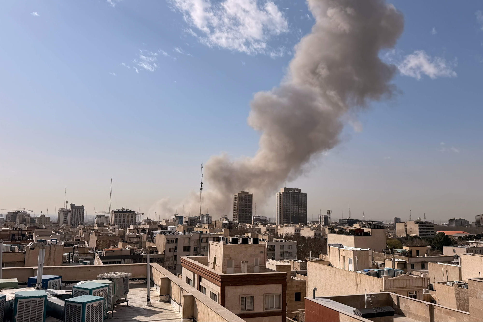 Smoke rises on the skyline after an explosion in Tehran, Iran, Saturday, Feb. 28, 2026.