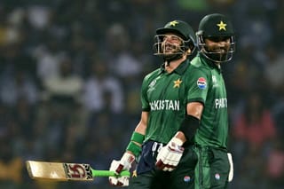 Pakistan's Sahibzada Farhan (L) and Fakhar Zaman react during the 2026 ICC Men's T20 Cricket World Cup Super Eights match between Sri Lanka and Pakistan at the Pallekele International Cricket Stadium in Kandy on February 28, 2026.