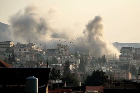 Smoke rises from the site of an Israeli airstrike that targeted the offices of Al-Qard al-Hassan, a Hezbollah-linked financial institution, in the city of Baalbeck in Lebanon's Bekaa valley.