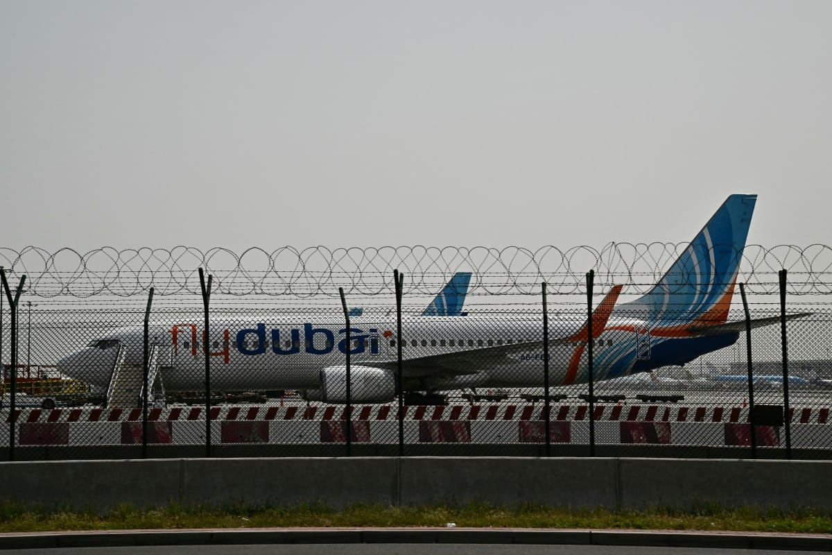 A flydubai plane is parked on the tarmac at Dubai International Airport as Iran retaliates following the US and Israel’s assassination of its supreme leader. 