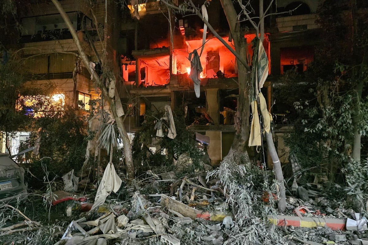 A fire is seen in a damaged building after an Israeli airstrike in Beirut's southern suburb neighborhood of Haret Hreik on March 2, 2026.