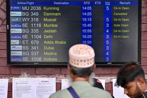A passenger looks at a flight information board at the Hazrat Shahjalal International Airport in Dhaka on March 3, 2026 after carriers cancelled flights amid the Middle East conflict. (Picture used for illustrative purposes only). 