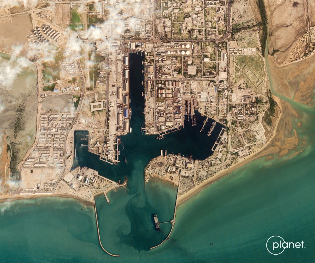 This handout satellite image taken by 2026 Planet Labs PBC shows damage at the military harbour in Iran's southern port of Bandar Abbas along the Strait of Hormuz on March 4, 2026.